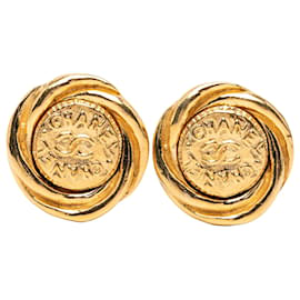 Orecchini a clip rotondi Chanel CC placcati oro