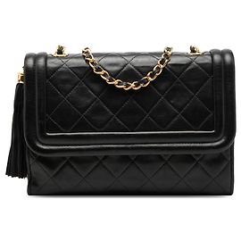 Borsa a tracolla Chanel in agnello trapuntato nero con nappa