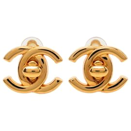 Orecchini a clip Chanel CC placcati oro con chiusura a vite