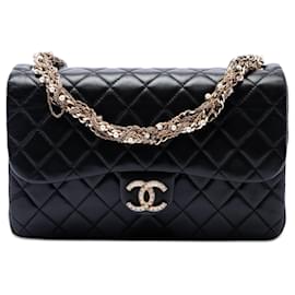 Borsa a tracolla Chanel Westminster in agnello trapuntato nero Medium con patta di perle