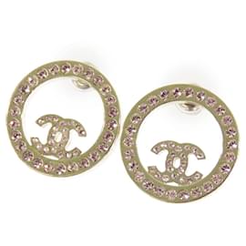 Orecchini rotondi Chanel CC placcati oro con strass e chiusura a pressione