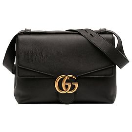 Borsa a tracolla con patta Gucci Large GG Marmont in pelle di vitello martellata nera
