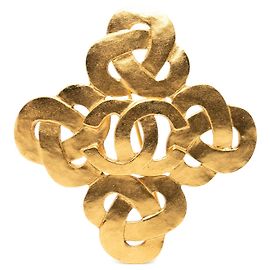 Spilla intrecciata Chanel CC placcata oro
