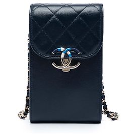 Porta móviles Chanel Caviar azul con cordón y bolso bandolera con cadena