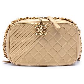 Borsa a tracolla Chanel Small Quilted Lambskin Coco Boy in agnello trapuntato oro