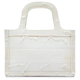 Mini Book Tote Dior in tela ricamata camouflage bianco