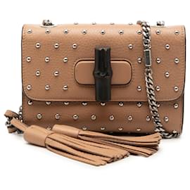 Borsa a tracolla Miss Bamboo piccola in pelle di vitello borchiata beige Gucci
