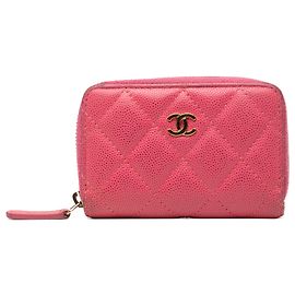 Monedero con cremallera Chanel CC de caviar acolchado rosa