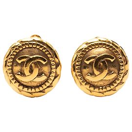 Orecchini a clip rotondi Chanel CC placcati in oro