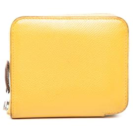 Portefeuille compact en soie et Epsom jaune Hermès