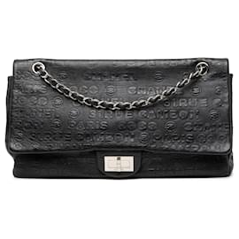 Borsa a tracolla Chanel Maxi Reissue 2.55 Double Flap in pelle di vitello goffrata nera