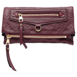 Clutch Petillante in Monogram Empreinte rosso Louis Vuitton