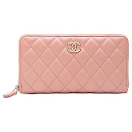 Cartera larga con cremallera Chanel CC de piel caviar acolchada rosa
