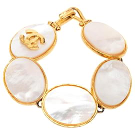Bracciale rigido Chanel Gold Plated CC in Madreperla Dorato
