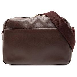 Borsa a tracolla Louis Vuitton Taiga Reporter PM rossa