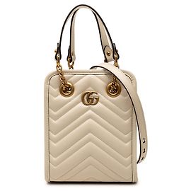 Borsa Gucci Mini GG Marmont in pelle matelassé Beige