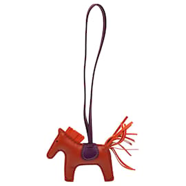Porte-clés Grigri Rodeo PM en cuir d'agneau Milo Orange Hermès