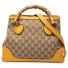 Borsa Tote Satchel Diana in tela GG gialla Gucci con manico in bambù