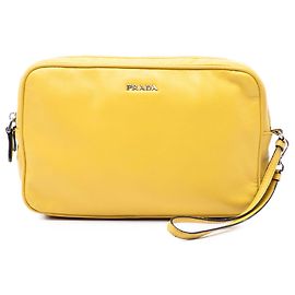 Clutch da polso in pelle gialla Prada