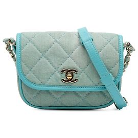 Borsa a tracolla Chanel Mini CC in denim trapuntato blu con patta