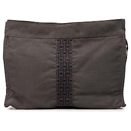 Clutch Herline Hermès in tela grigia