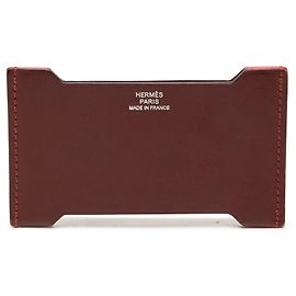 Tarjetero Hermès Tadelakt y Sombrero Manhattan rojo