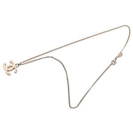 Collana con pendente Chanel CC placcata oro, smalto e strass