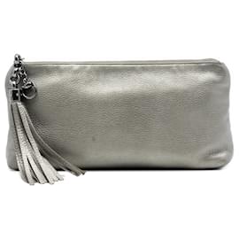 Clutch Sienna in pelle metallizzata oro Gucci con nappa