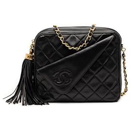 Borsa Camera Chanel Mini CC Quilted in pelle d'agnello nera con nappina