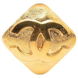 Spilla Chanel CC placcata oro e diamanti