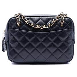 Borsa a tracolla Chanel Mini CC in agnello trapuntato nero con tasca e catena