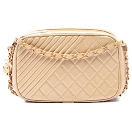 Borsa a tracolla Chanel Small Quilted Lambskin Coco Boy Gold