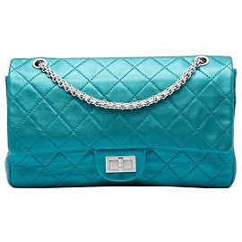Bolsa de ombro Chanel Reissue 2.55 Flap 227 em couro de vitelo metalizado matelassê azul