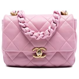 Borsa a tracolla Chanel Mini Candy in agnello trapuntato rosa con catena