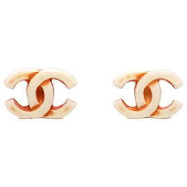 Chanel CC Clip-Ohrringe aus weißem Resin mit Goldbeschichtung