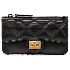 Portacarte Chanel Reissue 2.55 in pelle di vitello invecchiata trapuntata nera