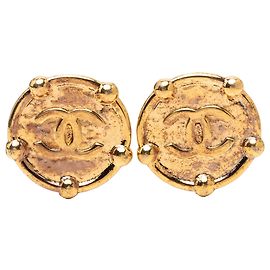 Orecchini a clip rotondi Chanel CC placcati oro