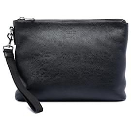 Clutch in pelle nera Gucci