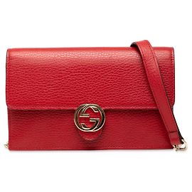 Portafoglio con catena Gucci in pelle rossa con logo G intrecciato
