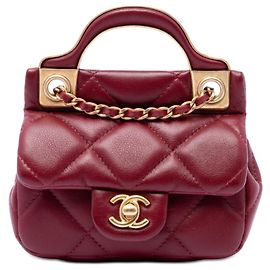 Portacarte Lady in pelle di vitello trapuntata rossa Chanel con borsa satchel con manico superiore a catena