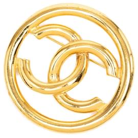 Spilla rotonda Chanel CC placcata oro