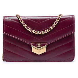 Borsa a tracolla con catena Medal in pelle di vitello Chevron rossa Chanel