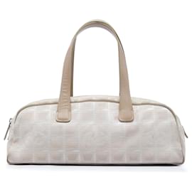 Bolsa de nylon Chanel New Travel Line bege