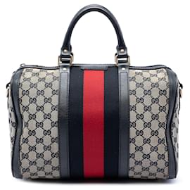 Bolso Boston y bolso satchel Gucci Medium GG Canvas Web beige
