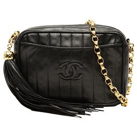 Borsa Camera Chanel CC in pelle d'agnello trapuntata verticale nera con nappa