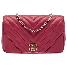 Borsa a tracolla Chanel Small Chevron Iridescent Caviar Statement Flap rossa