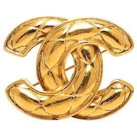 Spilla Chanel CC trapuntata placcata oro