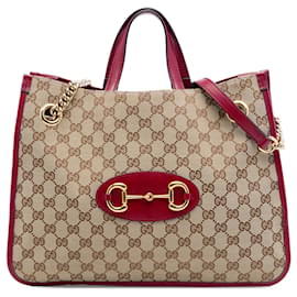 Borsa Tote con catena Gucci Medium GG Canvas Horsebit 1955 rossa