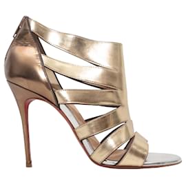 Sandali con tacco cutout in pelle metallizzata oro Christian Louboutin Taglia 37