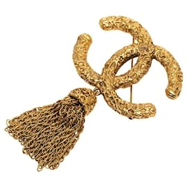 Spilla Chanel CC con nappa e frange lava placcata oro